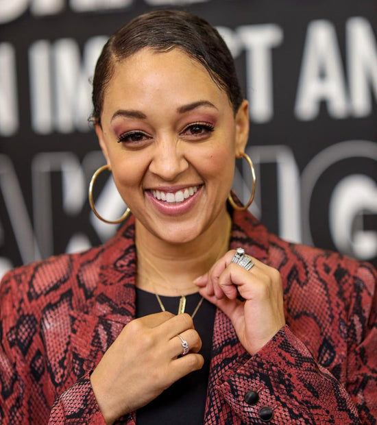 Tia Mowry at Female Quotient Equality Lounge NBA All Star in FQ Collection Use Your Voice Necklace